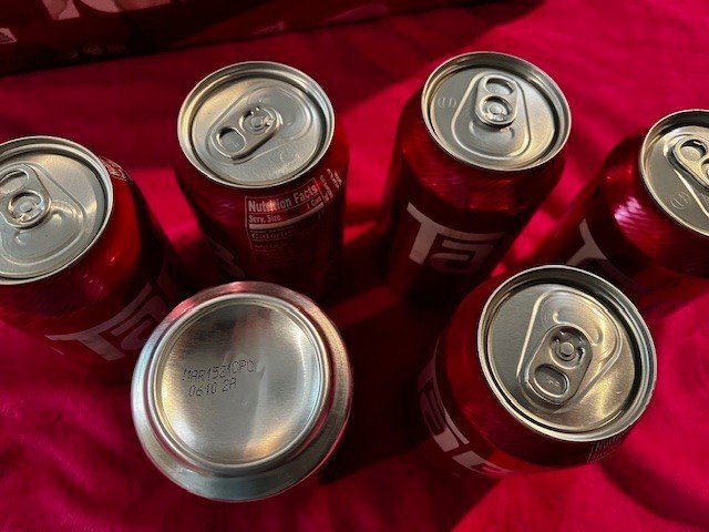 Tab Soda vintage bottles and aluminum cans quality packaging